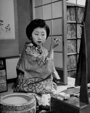 Vintage black and white photography - Japanese geisha getting ready.jpg